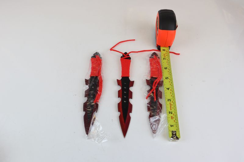 Photo 2 of 3 SET RED THROWING KNIVES 7 AND A HALF INCHES NEW 