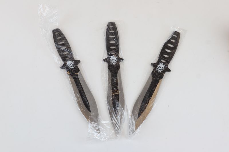 Photo 1 of 3 SET SLIVER SKULL THROWING KNIVES 10 AND A HALF INCHES NEW 