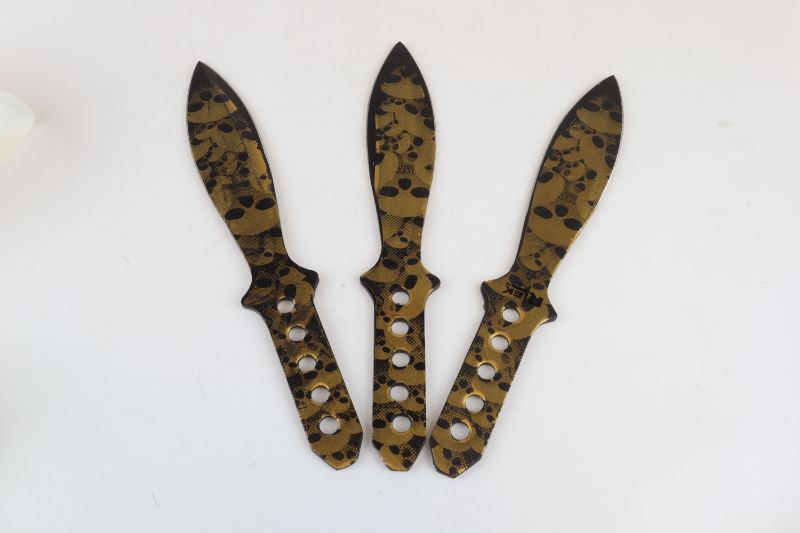 Photo 1 of 3 SET GOLD SKULL THROWING KNIVES 9 AND A HALF INCHES NEW 