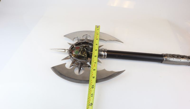 Photo 3 of DOUBLE ENDED SKULL AXE 26 INCHES LONG 10 INCHES WIDE BLADE IS USEABLE NEW 