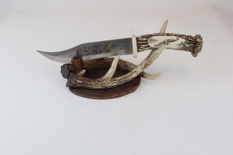 Photo 1 of EAGLE DECORATIVE KNIFE WITH ANTLER STAND ABOUT 1 FOOT  NEW 