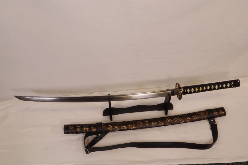 Photo 1 of SKULL SWORD WITH STAND 41 INCHES LONG USEABLE NEW 