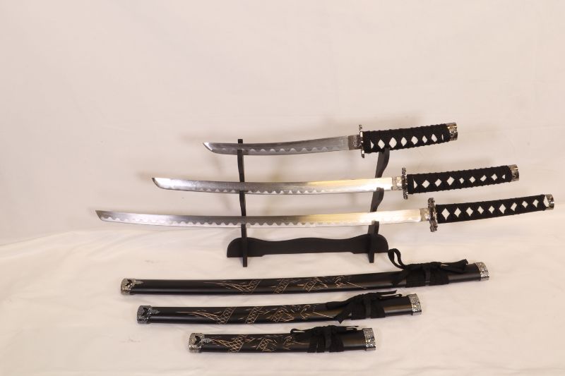 Photo 2 of 3 SET BLACK KATANA SWORDS WITH STAN LARGE 39 1/4 INCH MEDIUM IS 30 INCHES AND SMALL IS 20 INCHES LONG NEW 