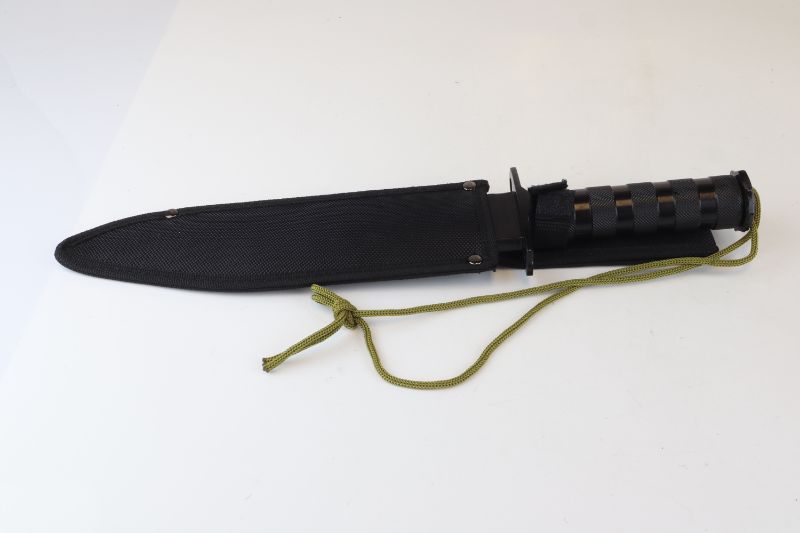 Photo 3 of TACTICAL KNIFE WITH CARRY CASE ABLE TO GO ON A BELT NEW