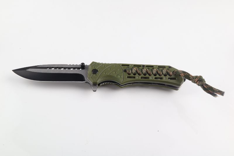 Photo 1 of TACTICAL KNIFE WITH PARACORD NEW 