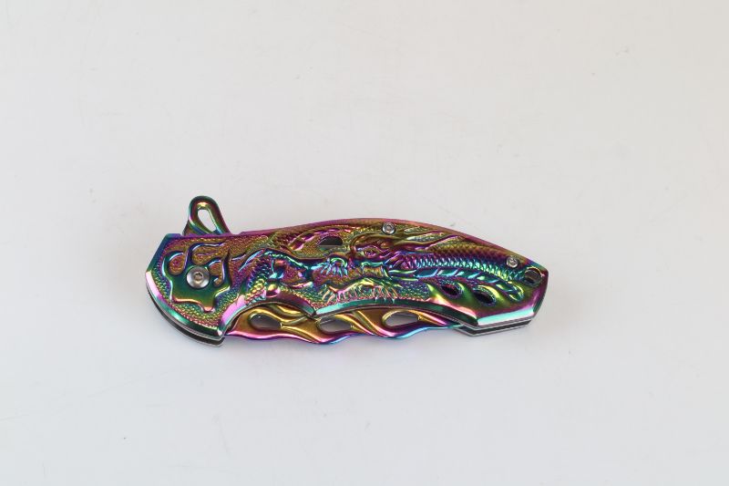 Photo 2 of METALLIC OILSLICK POCKET KNFE NEW