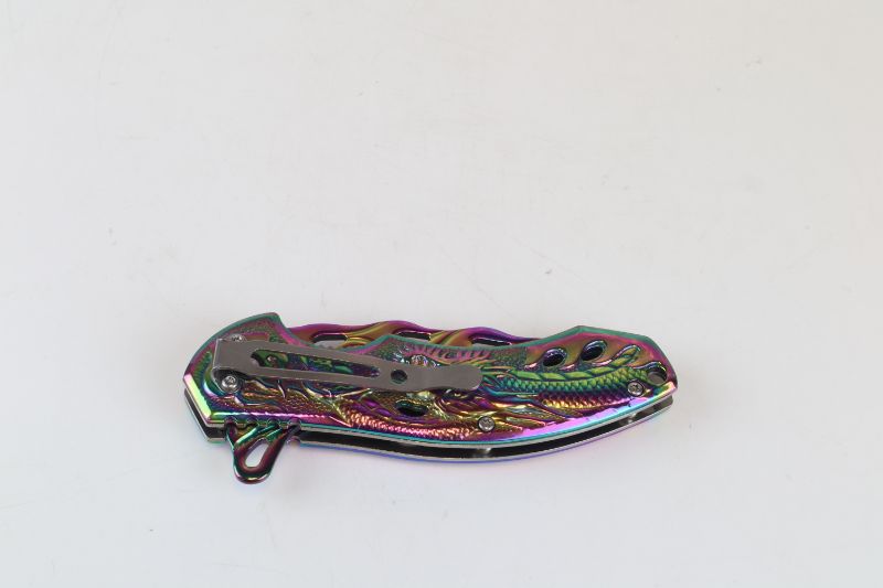 Photo 3 of METALLIC OILSLICK POCKET KNFE NEW