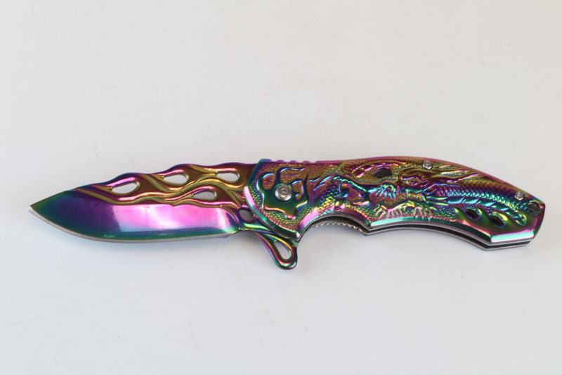 Photo 1 of METALLIC OILSLICK POCKET KNFE NEW