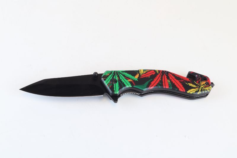 Photo 1 of RASTA FLOWER DESIGN POCKET KNIFE NEW