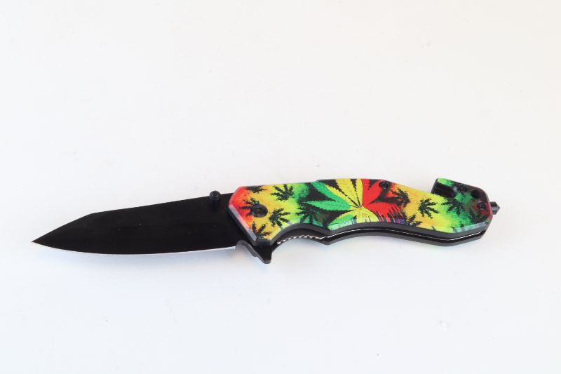 Photo 1 of RASTA FLOWER DESIGN POCKET KNIFE NEW