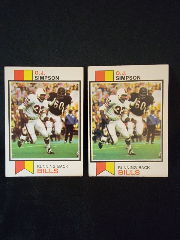 Photo 1 of (2) 1973 OJ SIMPSON CARDS - BOTH CARDS HAVE CREASES AS SEEN IN 3RD PHOTO