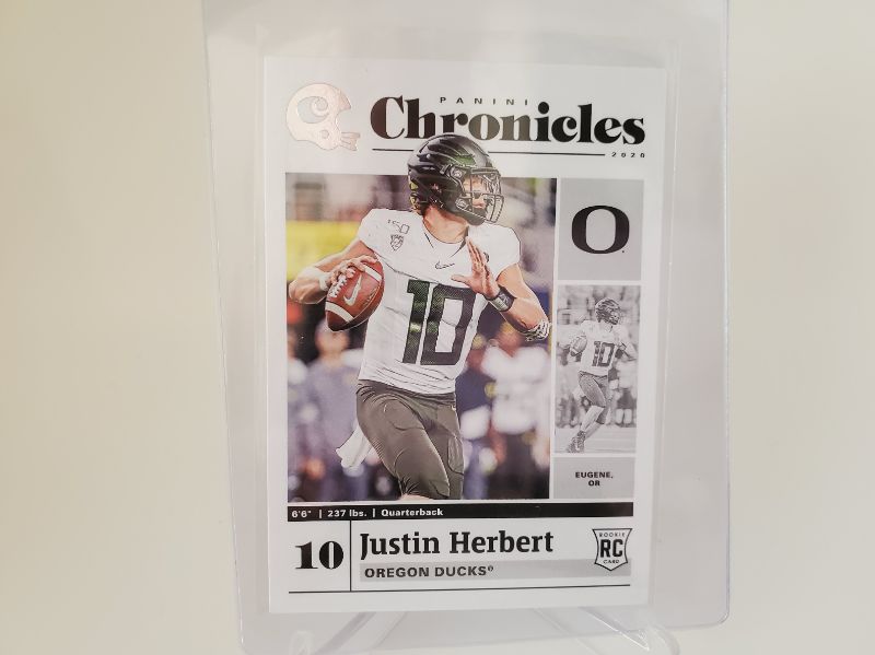 Photo 1 of 2020 PANINI CHRONICLES JUSTIN HERBERT ROOKIE!!
GET THIS GRADED FAST LAST PSA 10 SOLD ON EBAY FOR 275!!!