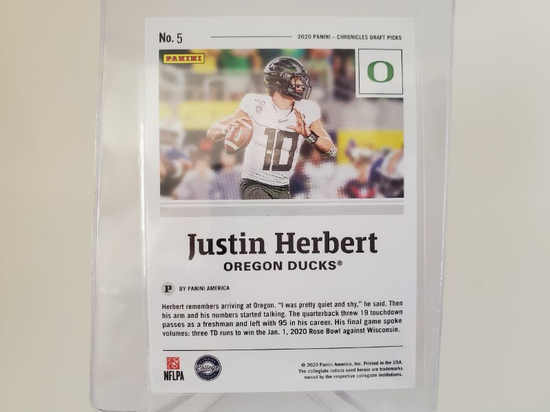 Photo 2 of 2020 PANINI CHRONICLES JUSTIN HERBERT ROOKIE!!
GET THIS GRADED FAST LAST PSA 10 SOLD ON EBAY FOR 275!!!