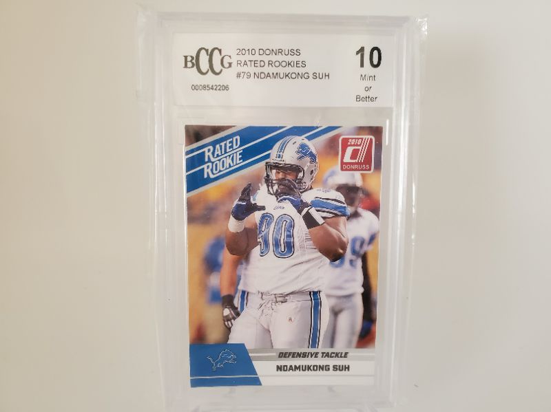 Photo 1 of 2010 NDAMUKONG SUH ROOKIE GRADED 10!!!
WHAT A PERFECT CARD HERE!!
DON'T GET STOMPED ON!! GET IN NOW!!