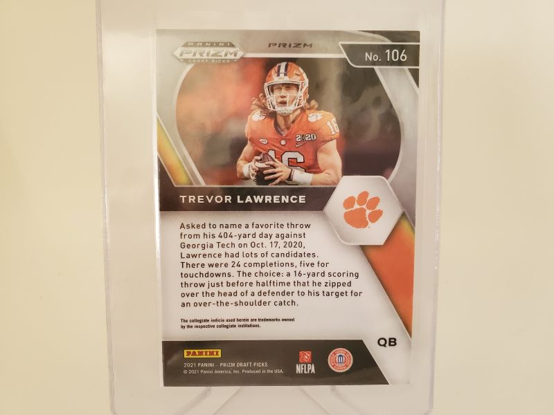 Photo 2 of 2021 PANINI PRIZM RED/WHITE/BLUE TREVOR LAWRENCE ROOKIE!!
THIS CARD IS IMMACULATE AND GET IT GRADED FAST!!
