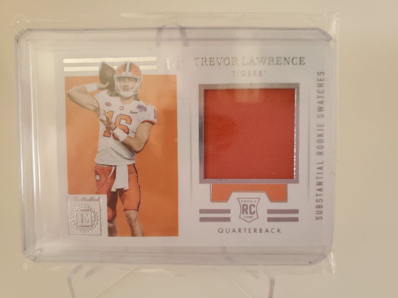 Photo 1 of 2021 PANINI CHRONICLES ROOKIE PATCH TREVOR LAWRENCE!!
THIS IS A PERFECT CARD AND GET IT GRADED FAST!!!