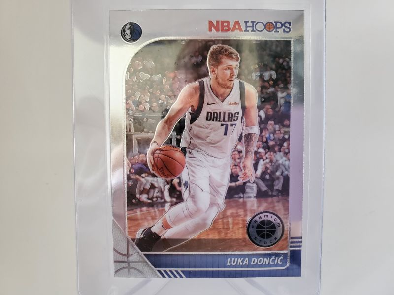 Photo 1 of 2019 HOOPS PREMIUM STOCK LUKA DONCIC!!
WOW A MINT CARD FOR THE SLOVAK SENSATION
