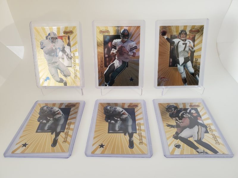 Photo 1 of 1998 BOWMANS FINEST FOOTBALL 6 PLAYERS!!
BARRY SANDERS, EMMITT SMITH, JOHN ELWAY, AIKMAN!!
EACH CARD IS OVER 50 A PIECE IF PSA MINT!! LOOK AT THESE CARDS!!