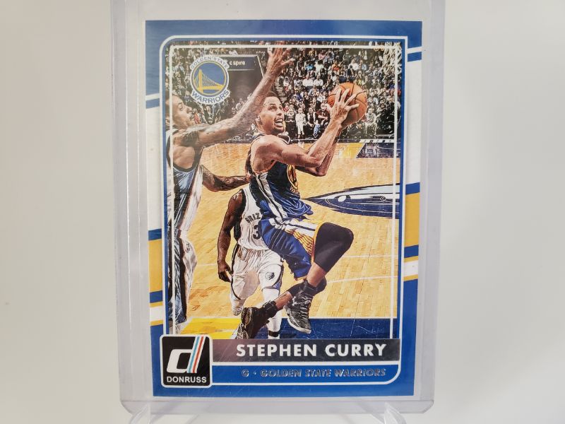 Photo 1 of 2014 STEPH CURRY DONRUSS CARD!!
EARLY CARD FOR THE GREATEST SHOOTER IN LEAGUE HISTORY!!