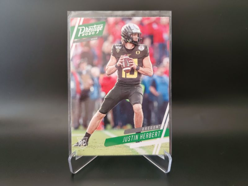 Photo 1 of 2020 PANINI PRESTIGE JUSTIN HERBERT ROOKIE!!
ABSOLUTELY IMMACULATE!!