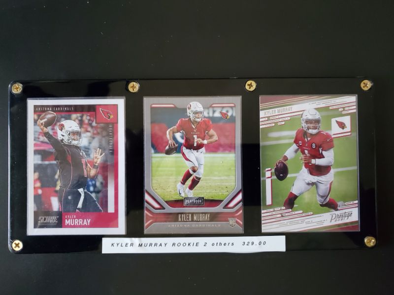 Photo 1 of (3) KYLER MURRAY CARDS!! INCLUDING 2019 PLAYOFF ROOKIE CARD!
MSRP=$329.00