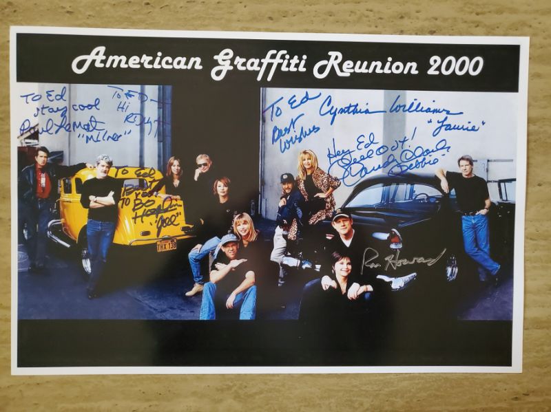 Photo 1 of 2000 AMERICAN GRAFFITI AUTOGRAPHED PICTURE!!
RON HOWARD, CINDY WILLIAMS, SUZANNE SUMMERS AND MORE!!!
MSRP=$399.00
