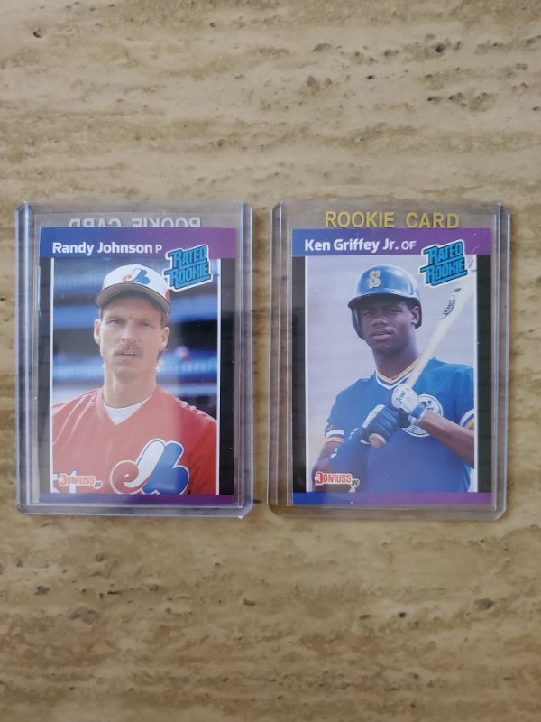 Photo 1 of 1989 KEN GRIFFEY JR ROOKIE!! WOW IS THIS SHARP!!
1989 RANDY JOHNSON ROOKIE CARD!! WOW ARE THESE NICE!!