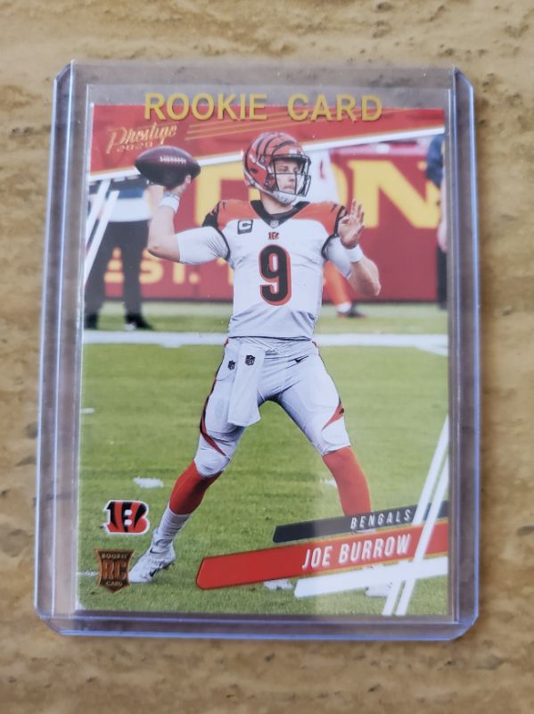 Photo 1 of 2020 PANINI PRESTIGE JOE BURROW ROOKIE!!
SHARP!! PICS DON'T LIE!!