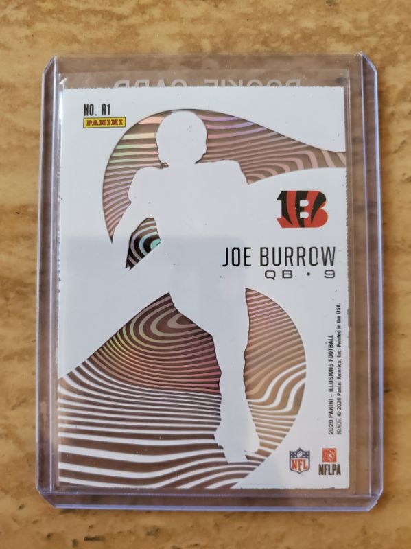 Photo 2 of 2020 PANINI ILLUSIONS JOE BURROW ROOKIE ASTOUNDING!!
WHAT A SHARP CARD HERE!!