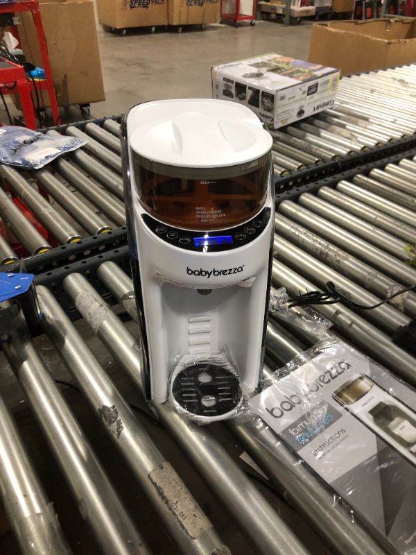 Photo 1 of New and Improved Baby Brezza Formula Pro Advanced Formula Dispenser Machine - Automatically Mix a Warm Formula Bottle Instantly - Easily Make Bottle with Automatic Powder Blending