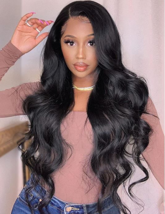 Photo 1 of AISI HAIR Long Wavy Black Wigs for Women 28 Inch Body Wave Wig Synthetic Side Part Wigs Natural Looking Heat Resistant Full Wig Daily
