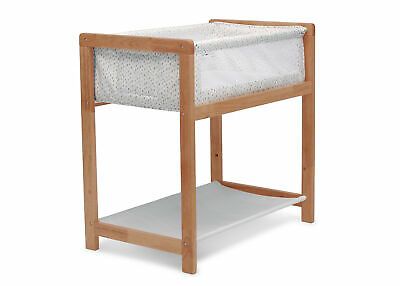 Photo 1 of Delta Children Classic Wood Bedside Bassinet Sleeper, Brown Paint Dabs
