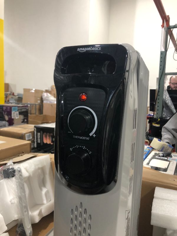 Photo 2 of Amazon Basics Indoor Portable Radiator Heater - White
