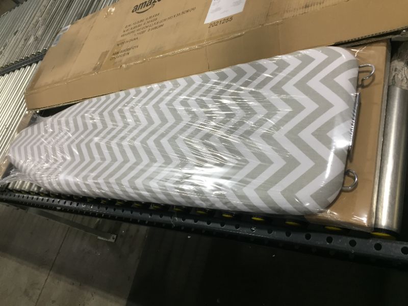 Photo 2 of Amazon Basics Full-Size Ironing Board - 4-Leg Fold-Up, Chevron Removable Cover
