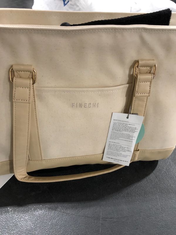 Photo 2 of FINECHI Diaper Bag | Lightweight, Stroller Hooks Included, Mini Ice Pocket, Non-Toxic Materials (Original IVORY)
COLORS MAY VARY