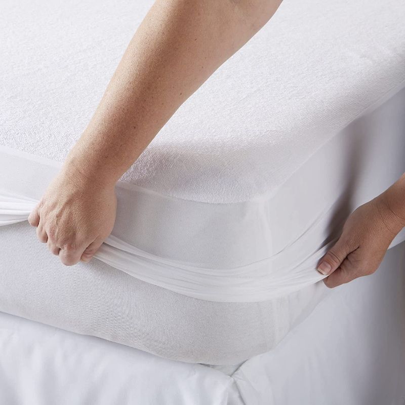 Photo 1 of downluxe Twin Mattress Protector Waterproof - Smooth Soft Cotton Terry Mattress Cover - 39" x 75" Noiseless Bed Mattress Protector (White)
