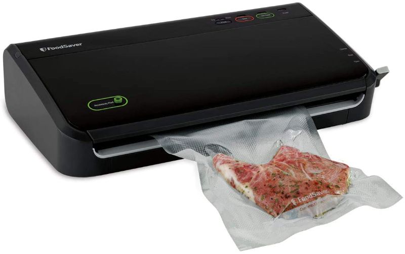 Photo 1 of FoodSaver FM2100-000 Vacuum Sealer Machine System with Starter Vacuum Seal Bags & Rolls, Safety Certified, Black
