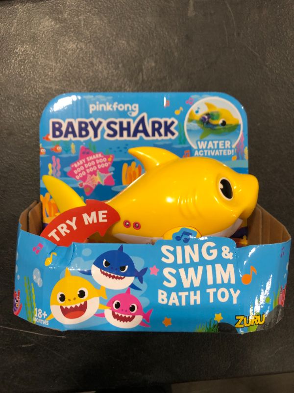 Photo 2 of Robo Alive Junior Baby Shark Battery-Powered Sing and Swim Bath Toy by ZURU - Baby Shark (Yellow)
