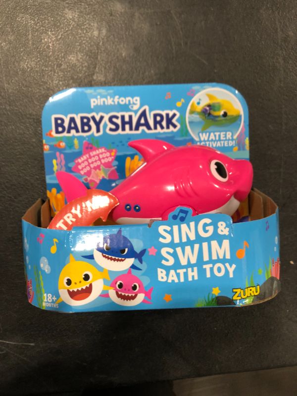 Photo 2 of Robo Alive Junior Baby Shark Battery-Powered Sing and Swim Bath Toy by ZURU - Mommy Shark (Pink
