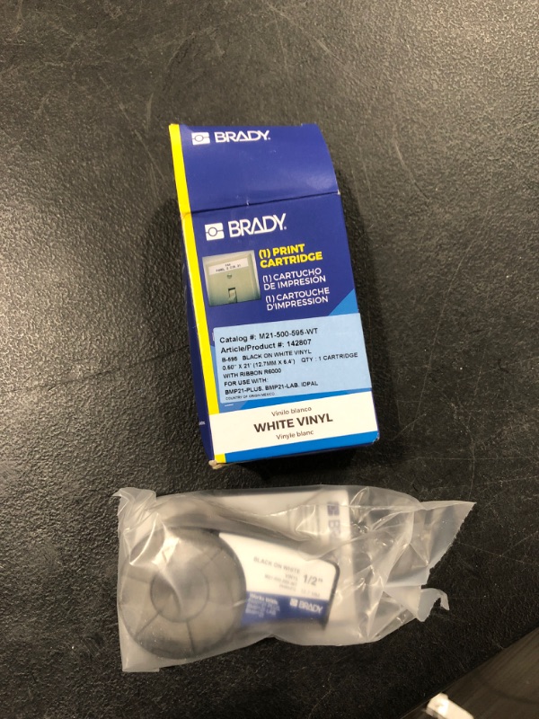 Photo 2 of Brady Authentic (M21-500-595-WT) All-Weather Vinyl Label for Indoor/Outdoor Identification, Laboratory and Equipment Labeling, Black on White material - Designed for BMP21-PLUS and BMP21-LAB Label Printers, .5" Width, 21' Length
