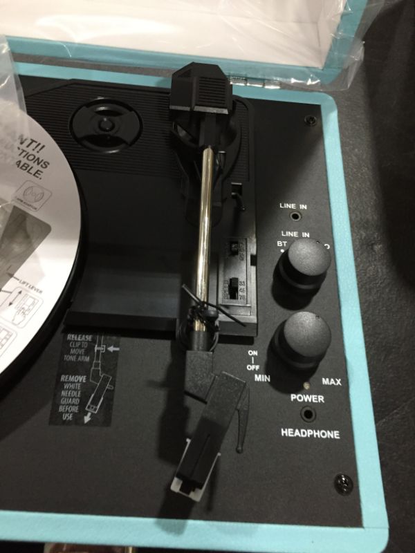 Photo 1 of Victrola Bluetooth Portable Suitcase Record Player with 3-Speed Turntable - Turquoise