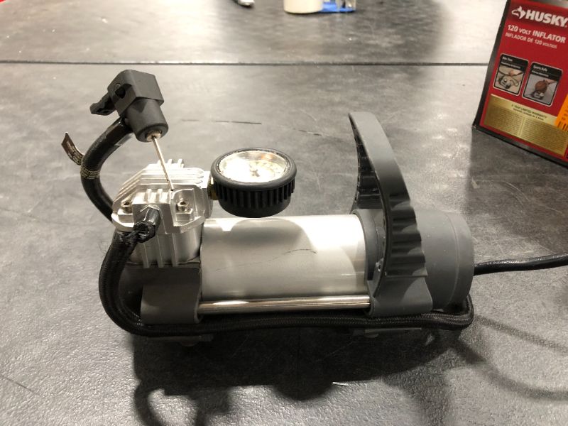 Photo 1 of Husky 120 Volt Inflator 365 164
