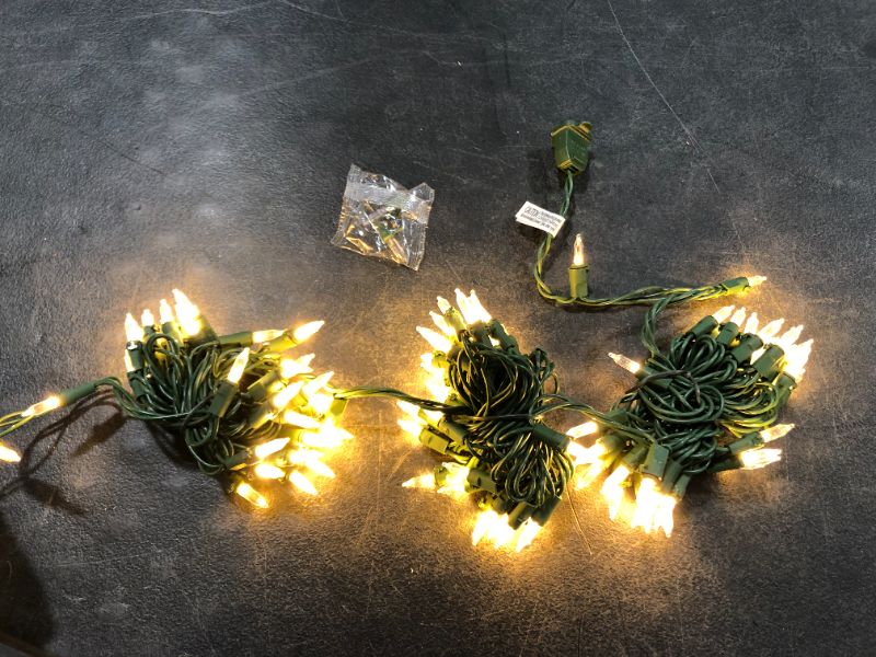 Photo 1 of 29.5 Ft. 100-Light LED Mini Warm White String Light with Green Wire Christmas Decoration
