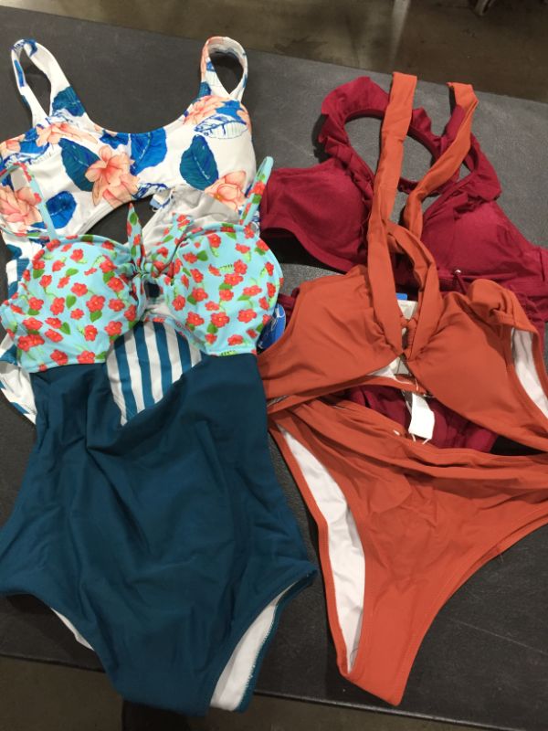 Photo 2 of WOMENS SWIMSUIT LOT
SIZE XS AND S
SOLD AS IS 4 TOTAL