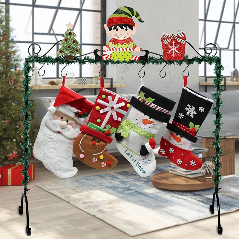 Photo 1 of FORUP Christmas Stocking Holder Stand Hangers, Christmas Elf Stocking Holder
