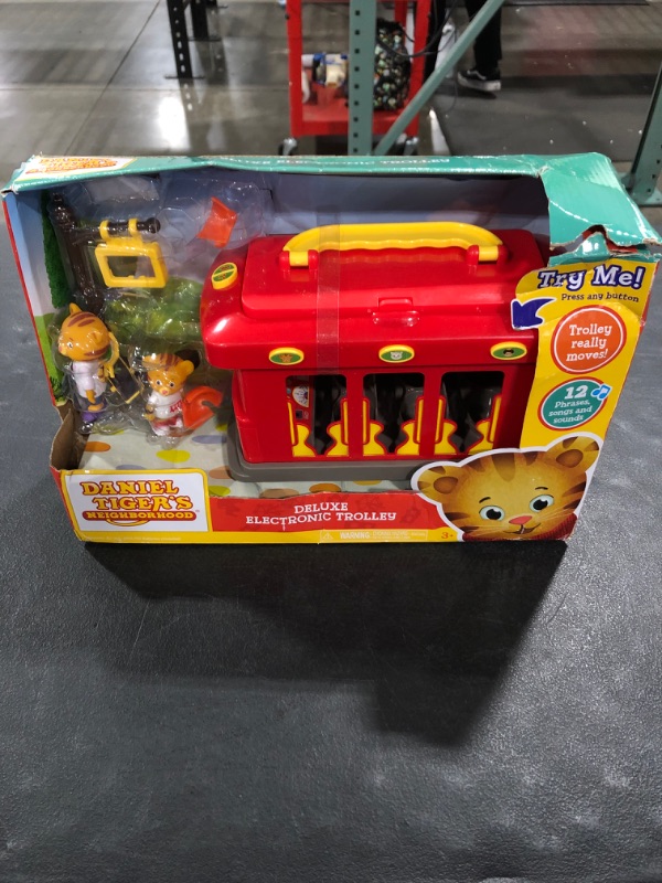 Photo 2 of Daniel Tiger's Neighborhood Deluxe Electronic Trolley Vehicle with 2 Songs, 12 Phrases, Trolley Sounds & Light! Daniel & Mom Tiger Figures Included, For Ages 3+
