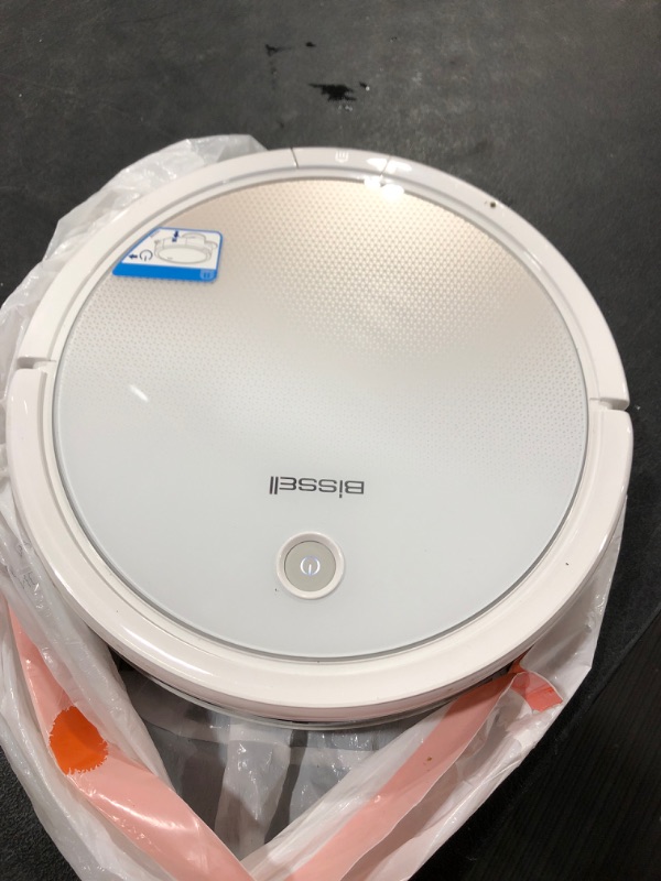 Photo 1 of Bissell SpinWave Pet Robot, 2-in-1 Wet Mop and Dry Robot Vacuum, WiFi Connected with Structured Navigation, 3347
