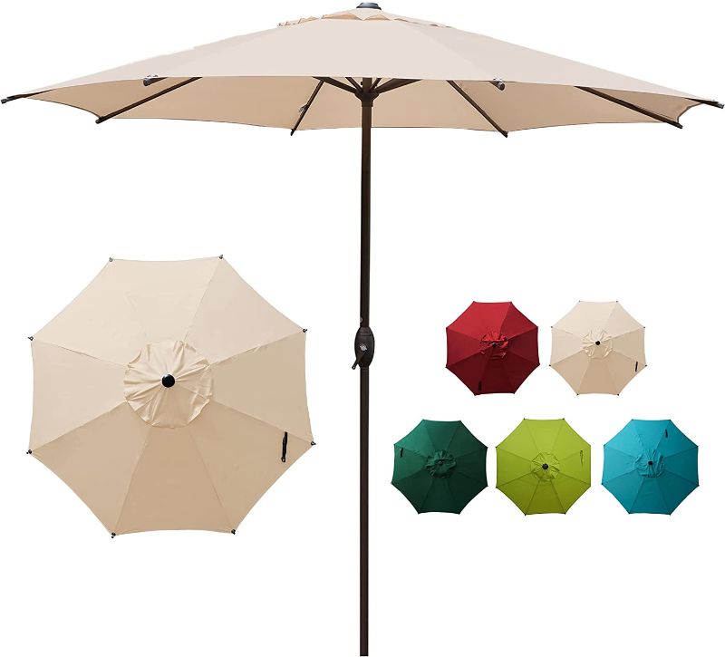 Photo 1 of Abba Patio 9ft Patio Umbrella Outdoor Market Table Umbrella with Push Button Tilt and Crank for Garden, Lawn, Deck, Backyard & Pool, 8 Sturdy Ribs, Beige
