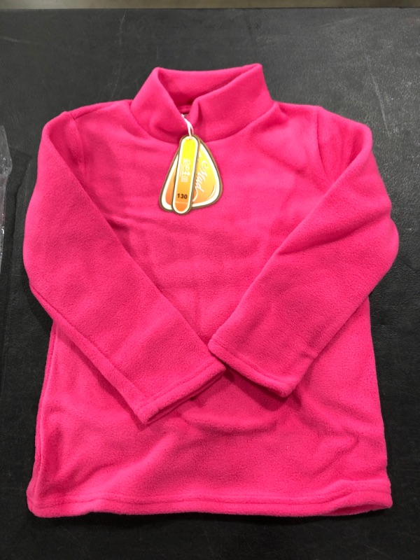 Photo 1 of MUD KINGDOM CHILDREN'S FLEECE TURTLNECK TOP, PINK, SIZE 130.