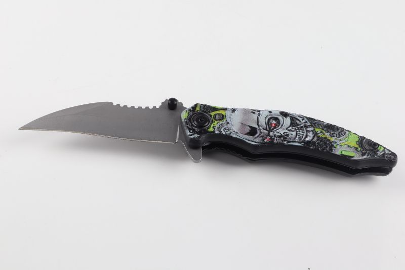 Photo 3 of GREEN SKULL KNIFE NEW 